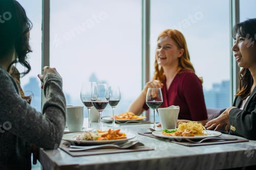 Preview: Group of diversity people are celebrating at luxury restaurant.