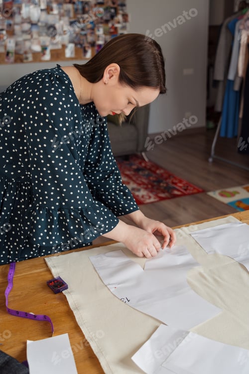 Preview: Fashion designer working on a new clothing pattern