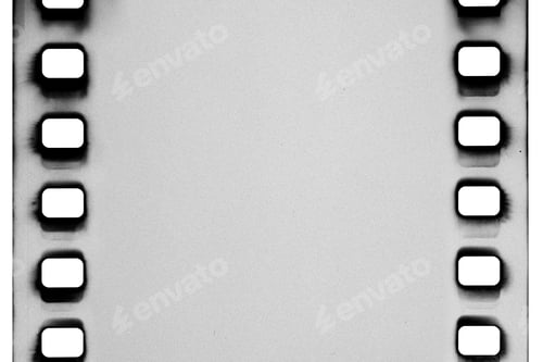 Preview: 35mm black and white film with sprocket light leaks isolated on a white.