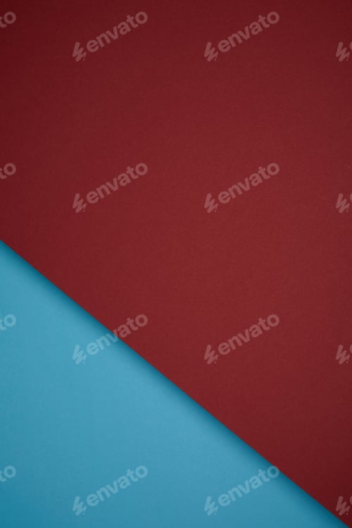 Preview: creative geometric background from red and blue colored paper