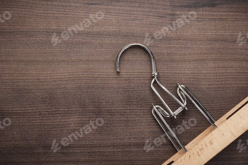 Preview: Clothes Hanger on Wood Background, Copy Space
