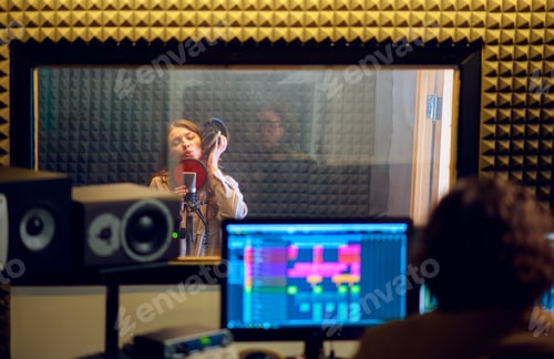Preview: Male musician and female singer, recording studio