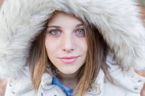 Preview: outdoors portrait of a beautiful young woman looking at the camera.autumn. sunset