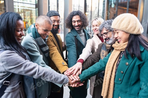 Preview: Group Group of positive professional coworker people stacking hands outside workplace