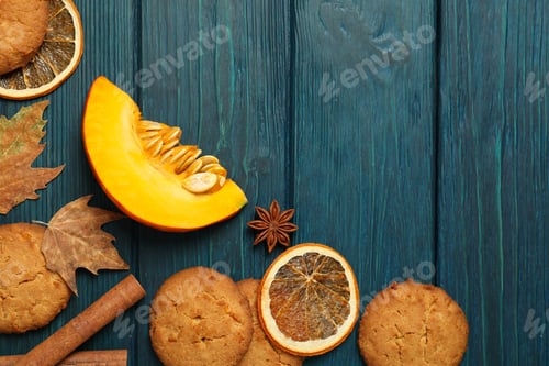 Preview: Pumpkin cookies on blue wooden background, space for text