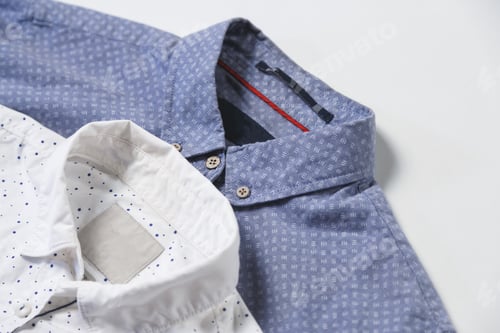Preview: Studio shot of couple of man's shirts on a grey background