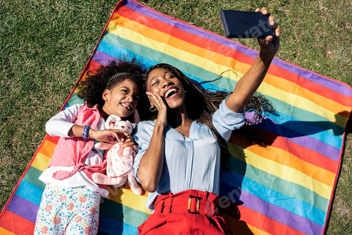 Preview: Afro Girl and her Mother Taking Selfie
