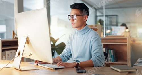 Preview: Asian man at computer, glasses and ideas, thinking and reading email, web review or article at digi