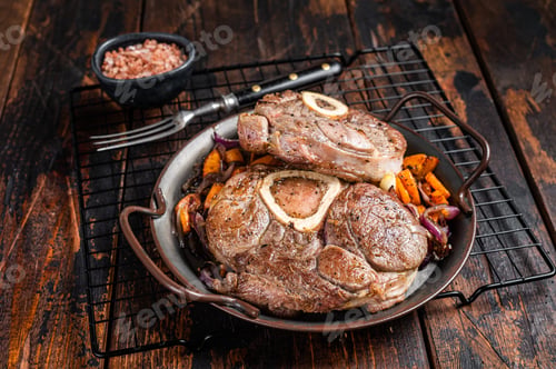 Preview: Veal shank stew Osso Buco, italian ossobuco meat steak. Wooden background. Top view