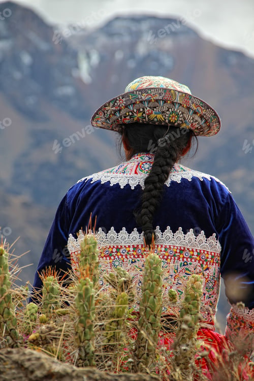 Preview: A local person in the mountains of the Colca Canyon on his back. Arequipa, Peru