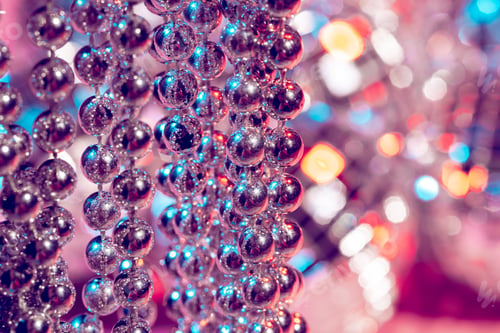 Preview: close up of silver beads. christmas and holiday decoration concept