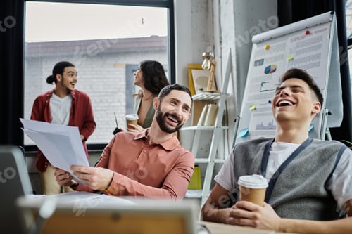 Preview: Colleagues Share Laughter Amidst Layoff Discussions in Modern Office Space