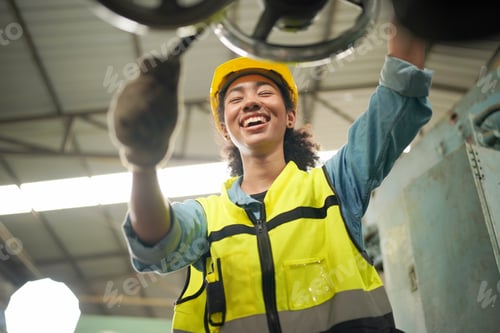 Preview: Female engineers working in industry factory.