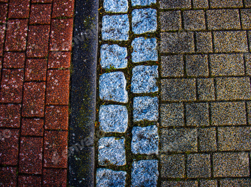 Preview: paving stone road, European stone road, moss on the road, moss growing between the cobblestones