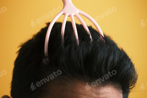 Preview: men having a scalp massage with a brush ,