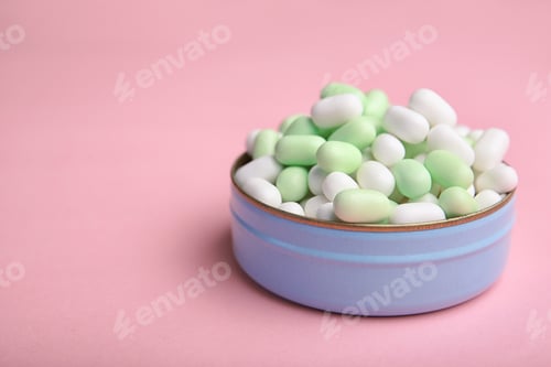 Preview: Open box with tasty mint candies on color background