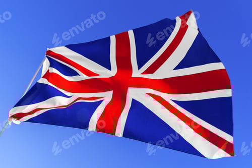 Preview: Flag of Great Britain waving against blue sky