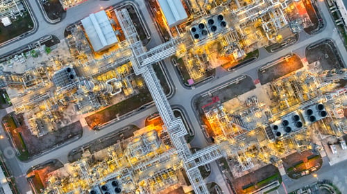Preview: Aerial top view petrochemical plant oil refinery storage tank pipe line at night, Petroleum