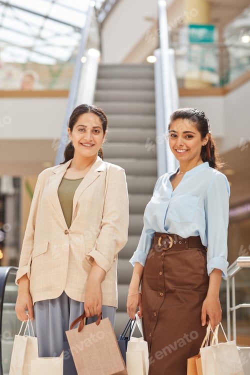 Preview: Middle Eastern Women Holding Bags in Shopping Mall