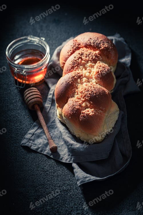 Preview: Healthy challah on dark table for breakfast