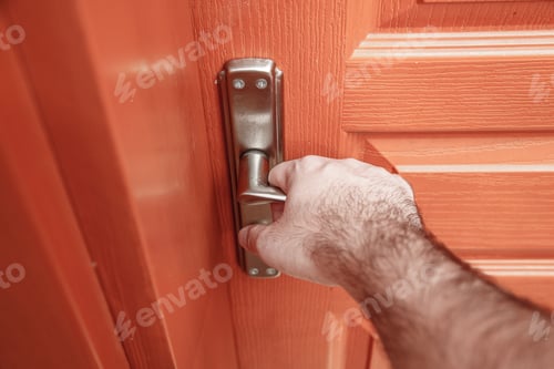 Preview: Iron Door Handle And Male Hand Opening The Door