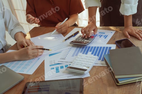 Preview: A group of professional businesswomen engaged a collaborative meeting in a modern office setting