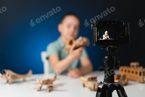 Preview: Young boy video blogger making stream with his followers