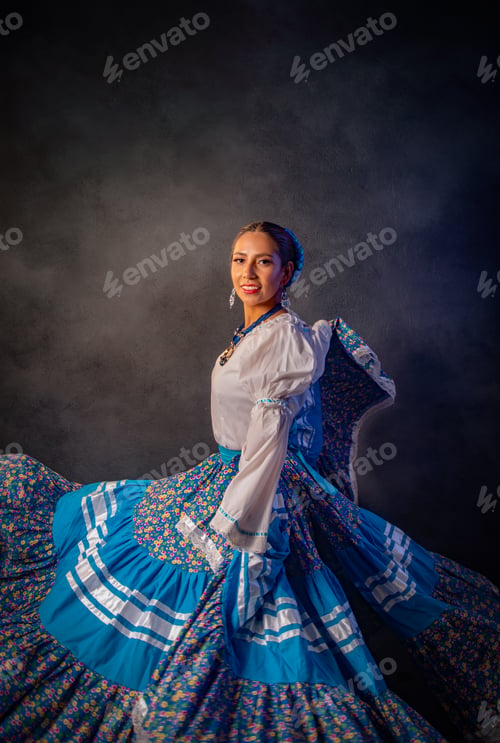 Preview: A woman in a blue skirt is dancing