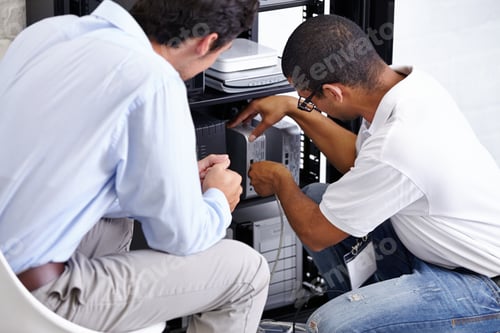 Preview: Hi tech service. A technician fixing his clients electronic device.
