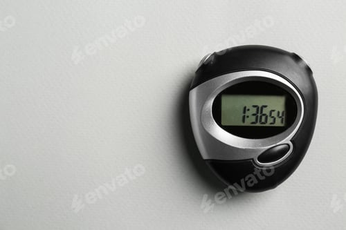 Preview: Digital timer on light grey background, top view. Space for text