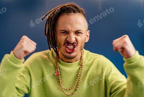 Preview: Portrait of a happy positive guy with dreadlocks