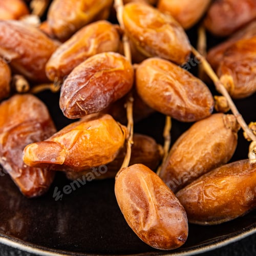 Preview: date on a branch dried sweet fruit fresh meal food snack on the table copy space food background