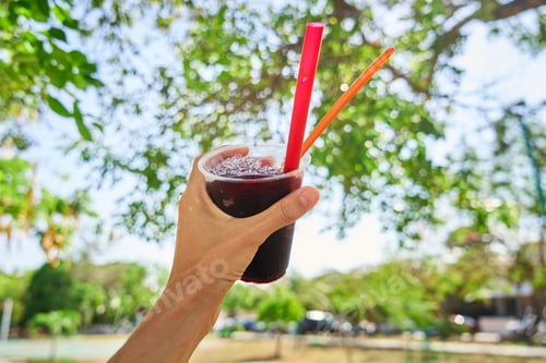 Preview: A vibrant red raspado, raspadilla or cholado ice summer treat or dessert
