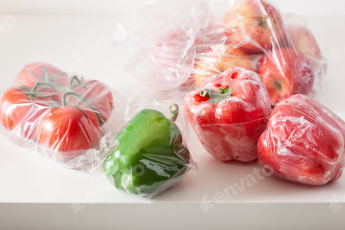 Preview: single use plastic waste issue. fruits and vegetables in plastic bags