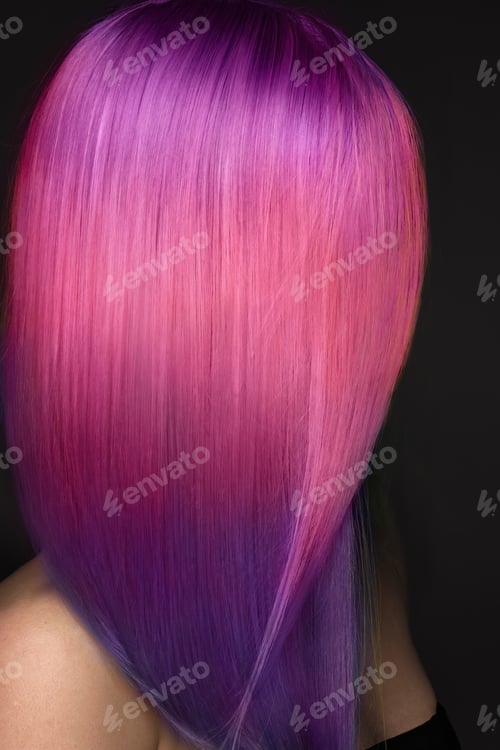 Preview: Beautiful woman with multi-colored pink and purple hair .