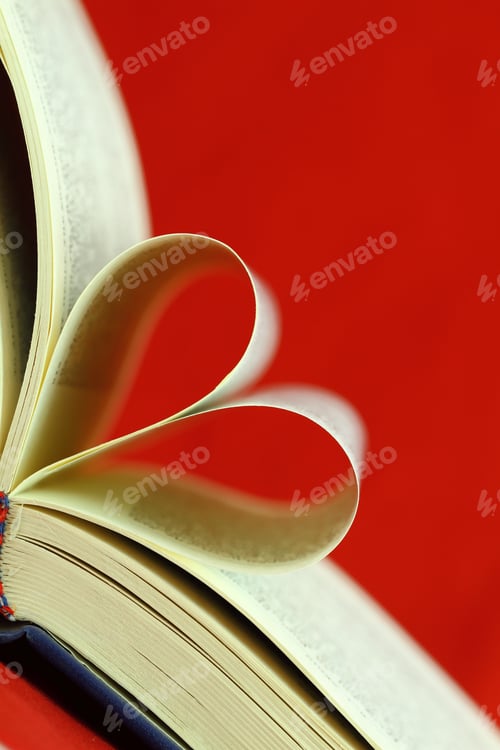Preview: Selective focus image of book pages folded into a heart shape
