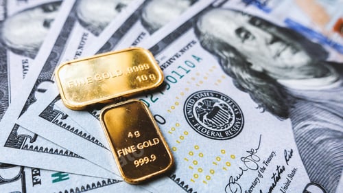 Preview: gold bar and US dollar bills