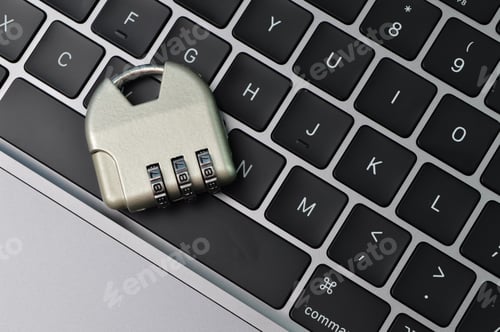 Preview: Top view of steel padlock and computer keyboard. Internet security and data protection concept.
