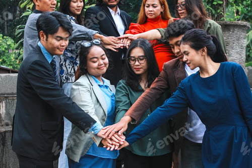 Preview: Business People Stacking Hands