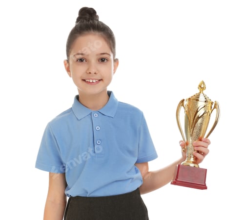 Preview: Happy girl in school uniform with golden winning cup isolated on white