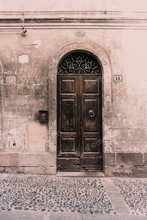 Preview: Closed door of old building