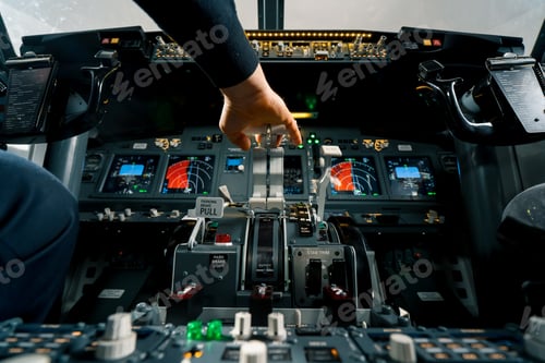 Preview: An airplane pilot controls the throttle during flight or takeoff View from inside the cabin