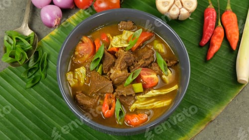Preview: Tongseng kambing is an Indonesian goat meat, mutton or beef stew dish in curry-like soup, with veget