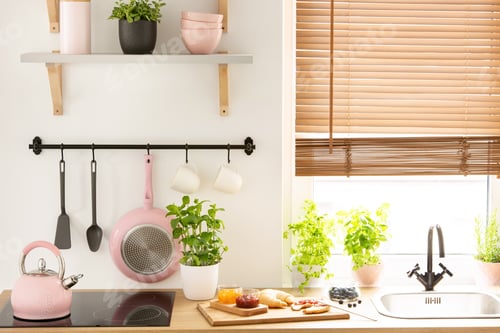 Preview: Real photo of wooden countertop with fresh plants, board with cr