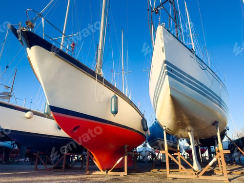 Preview: A view of the yachts at the dock. Sailing yachts parked in the marina. Maritime transportation.