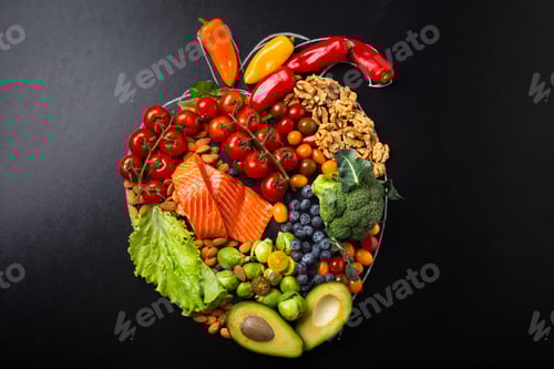 Preview: Healthy food arrangement in realistic heart shape, diet for heart and cardiovascular system