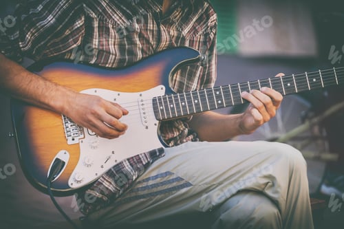 Preview: Street musician playing guitar