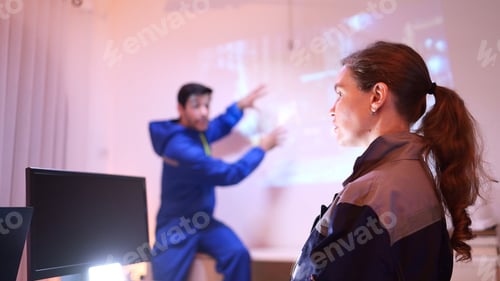 Preview: Engineers and industrial workers in safety uniforms discussing a tunnel construction