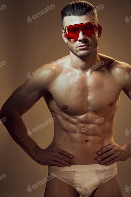 Preview: sporty man with muscular body fashion glasses white underpants posing