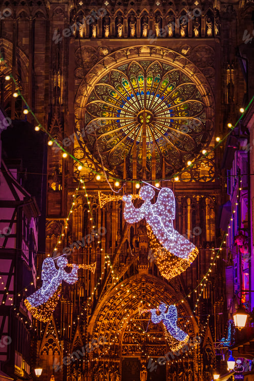 Preview: STRASBOURG, FRANCE - December 2016 - angel decoration in front of Cathedral Notre Dame